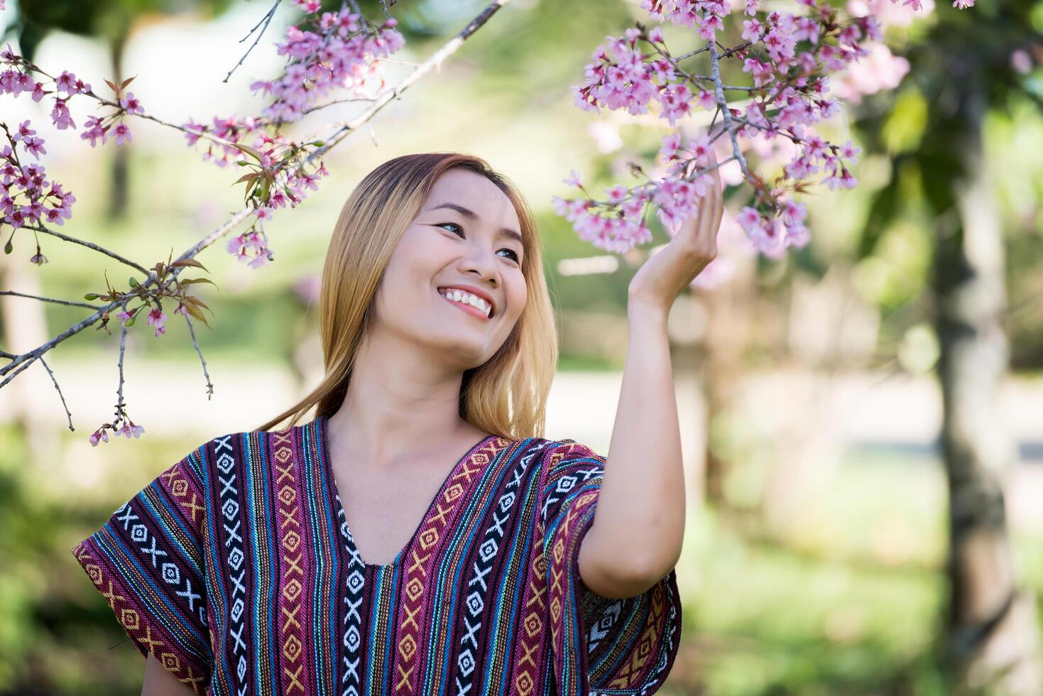 Happy women in nature background photo