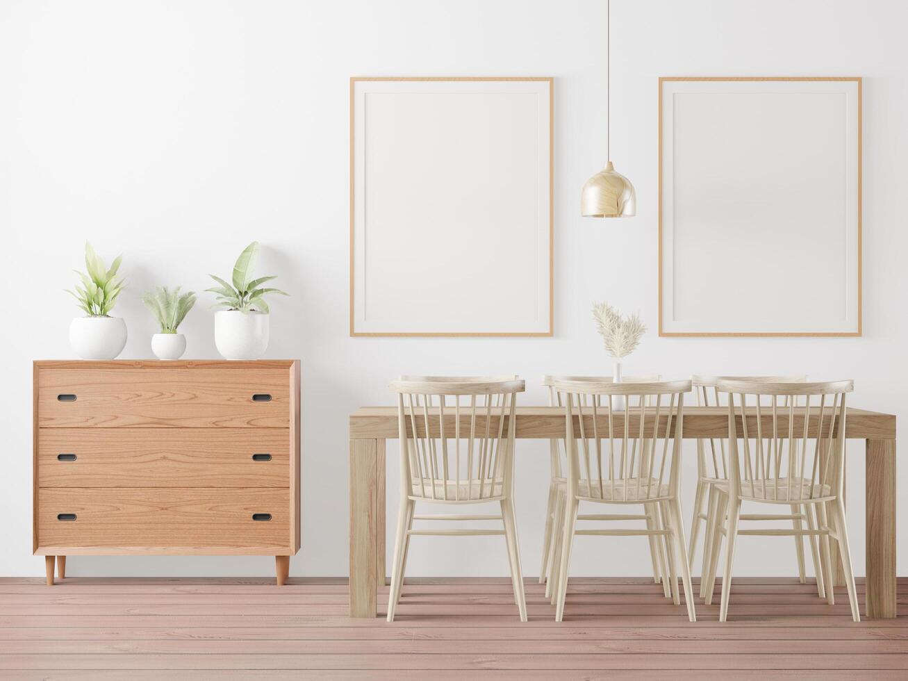 la mesa de comedor en la habitación tiene un marco de imagen pegado a la pared. foto