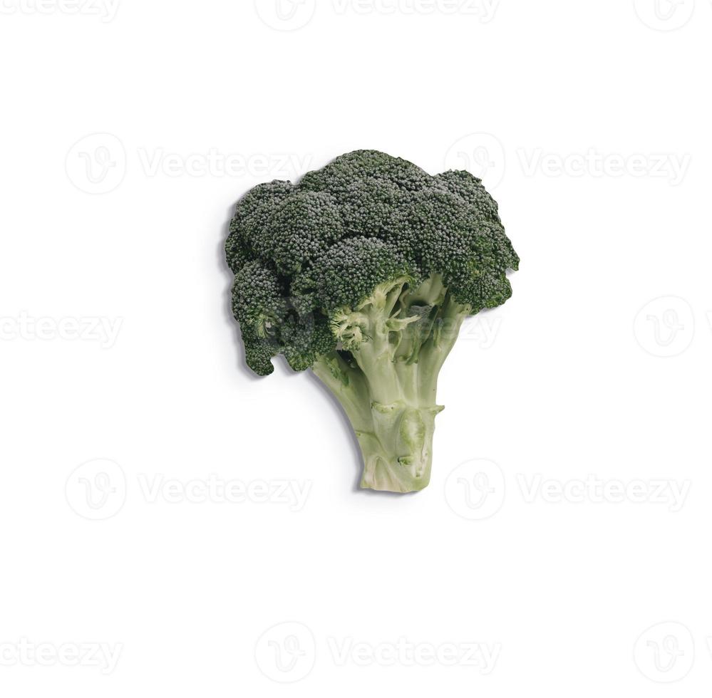 Close up view of fresh green broccoli isolated on white background. added copy space for text. photo