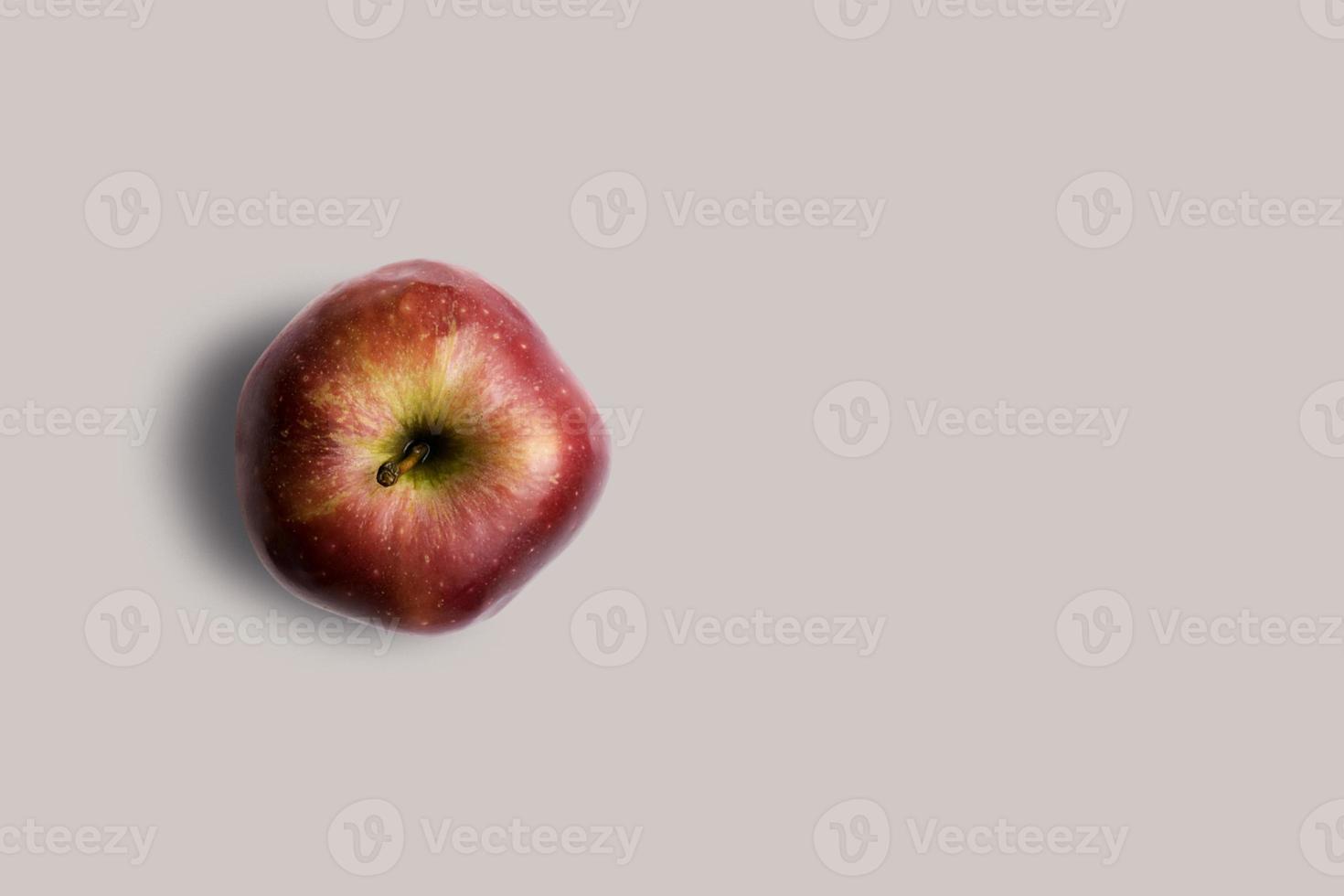 Top up up view fresh red apple isolated on grey background. suitable for your design project. photo