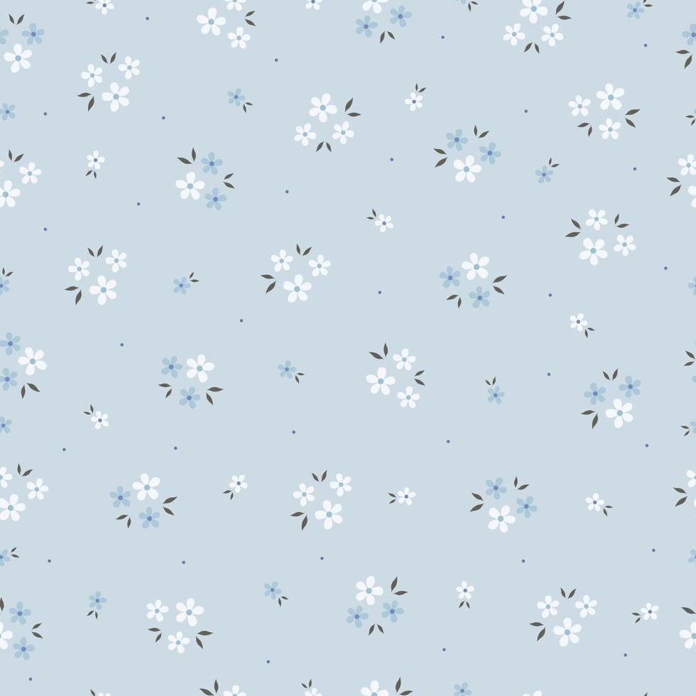 Beautiful seamless patterns Small white flowers randomly placed on a blue background Hand drawn design used for fabric, textiles, publications, gift wrapping. Vector illustration