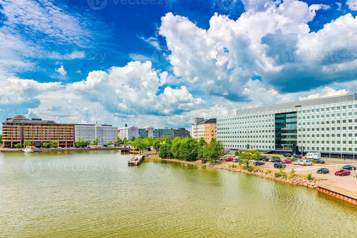 Modern buildings in the central part of Helsinki, Finland. Picturesque clouds and the blue sky over a modern quarter photo