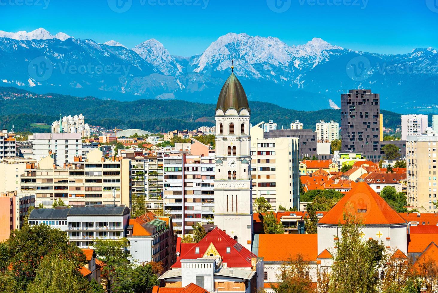 Picturesque panorama of Ljubljana with mountains in the background, Slovenia photo