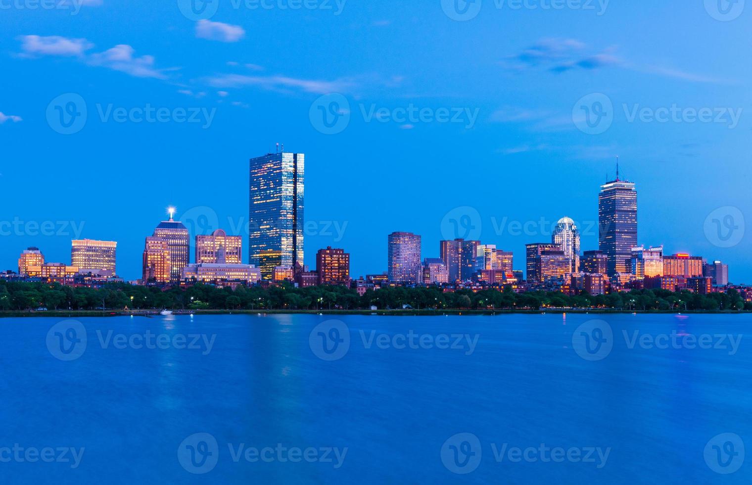 Boston cityscape. Panorama of Back Bay at dusk. View from Cambridge across The Charles River, Massachusetts, USA photo