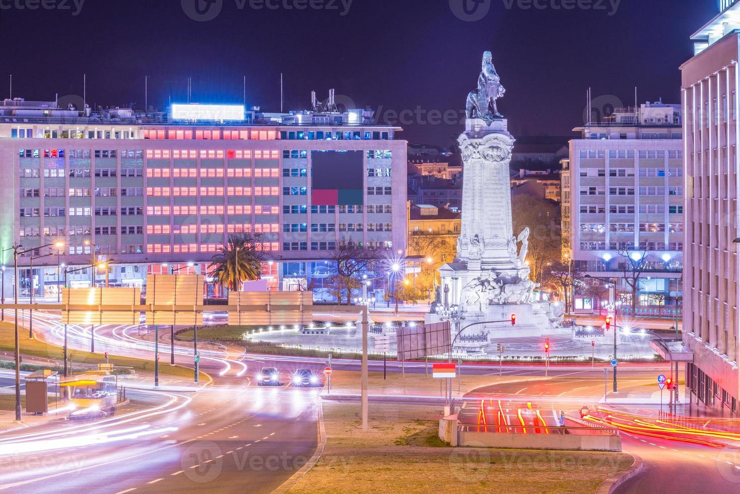 Night view of the Marquis of Pombal Square in Lisbon, Portugal photo