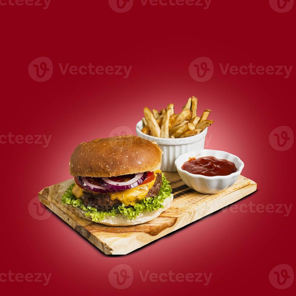 Freshly made burger with melted cheese, onions, tomatoes and lettuce filling. fit for your food concept. photo