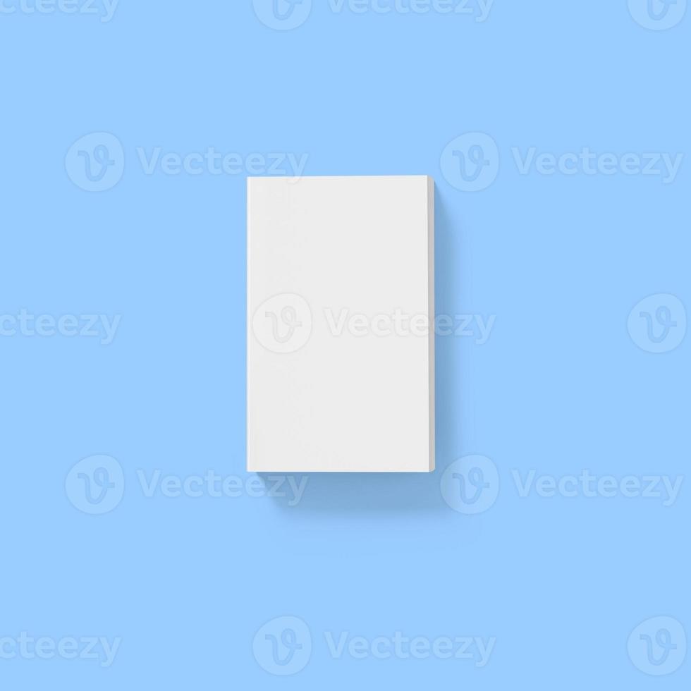 Back to school concept , hard cover blank white book front close isolated on blue photo