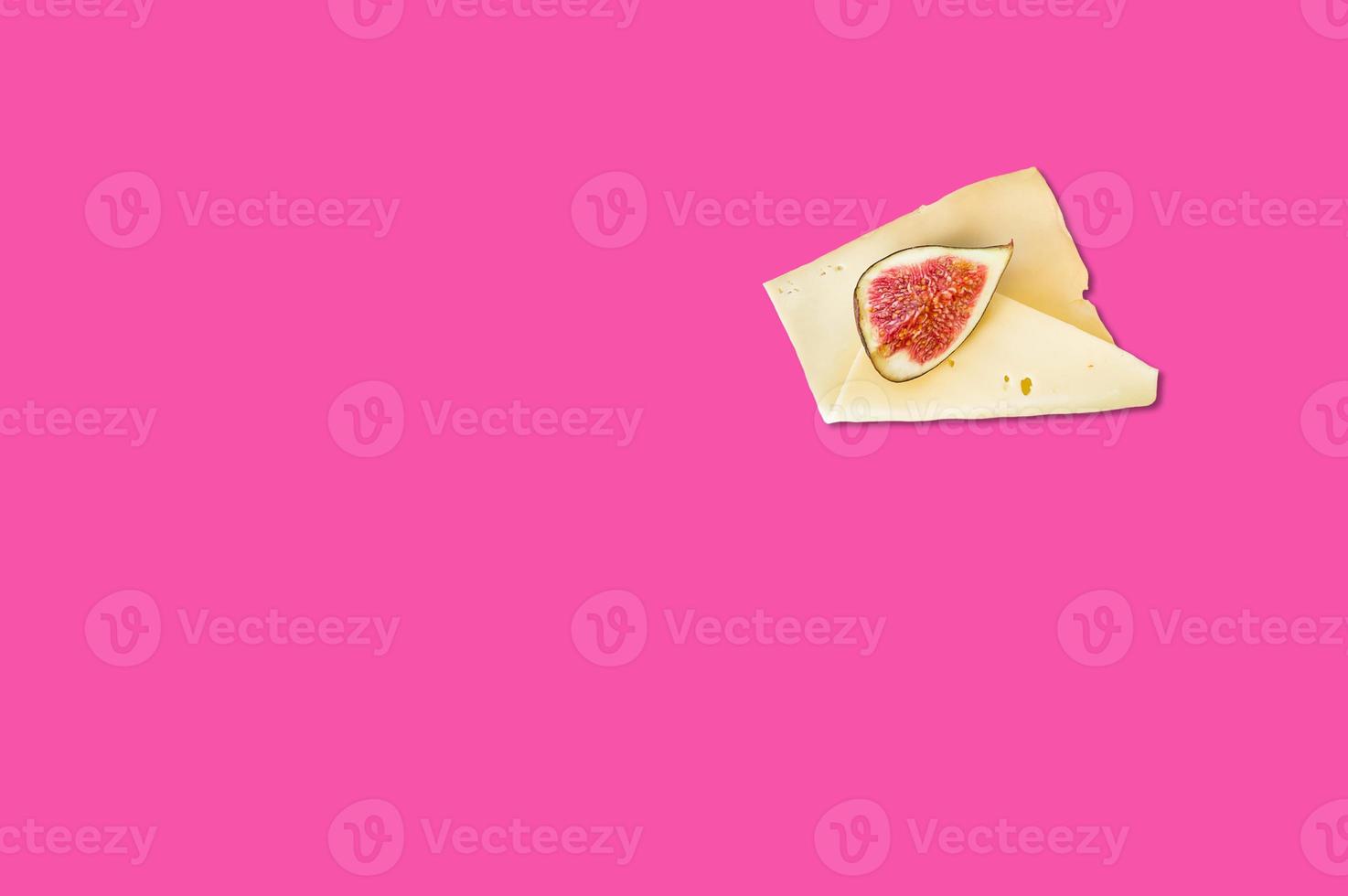 Cheese piece in Creative conceptual top view flat lay composition with copy space isolated on pink background in minimal style photo