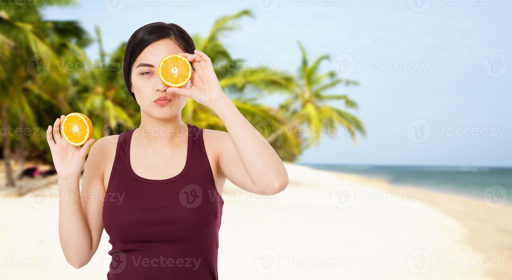 summer vacation concept - woman on the background of the beach and the sea, tropics photo