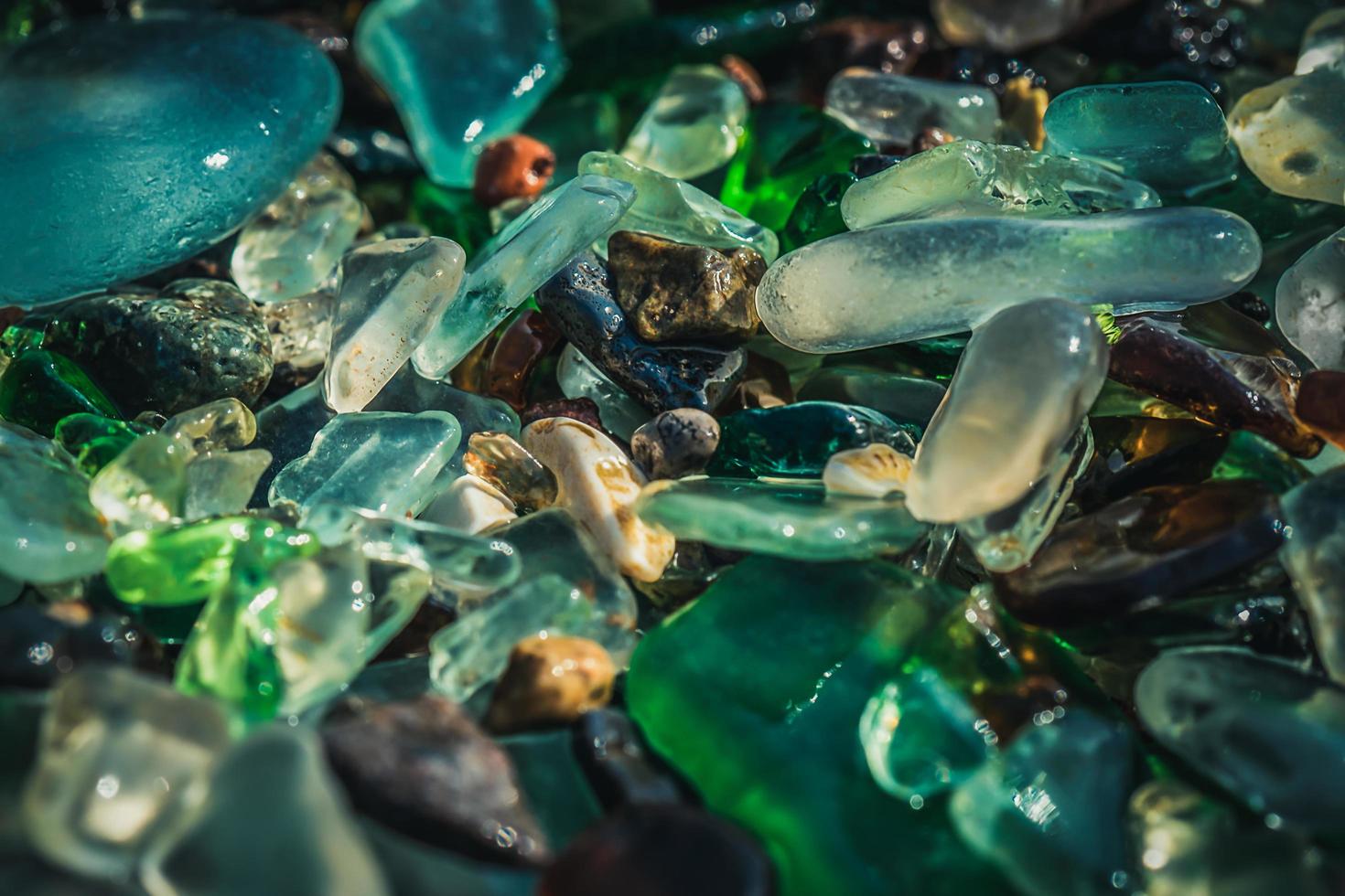 Natural background with sea glass close-up on sand. 4572641 Stock Photo