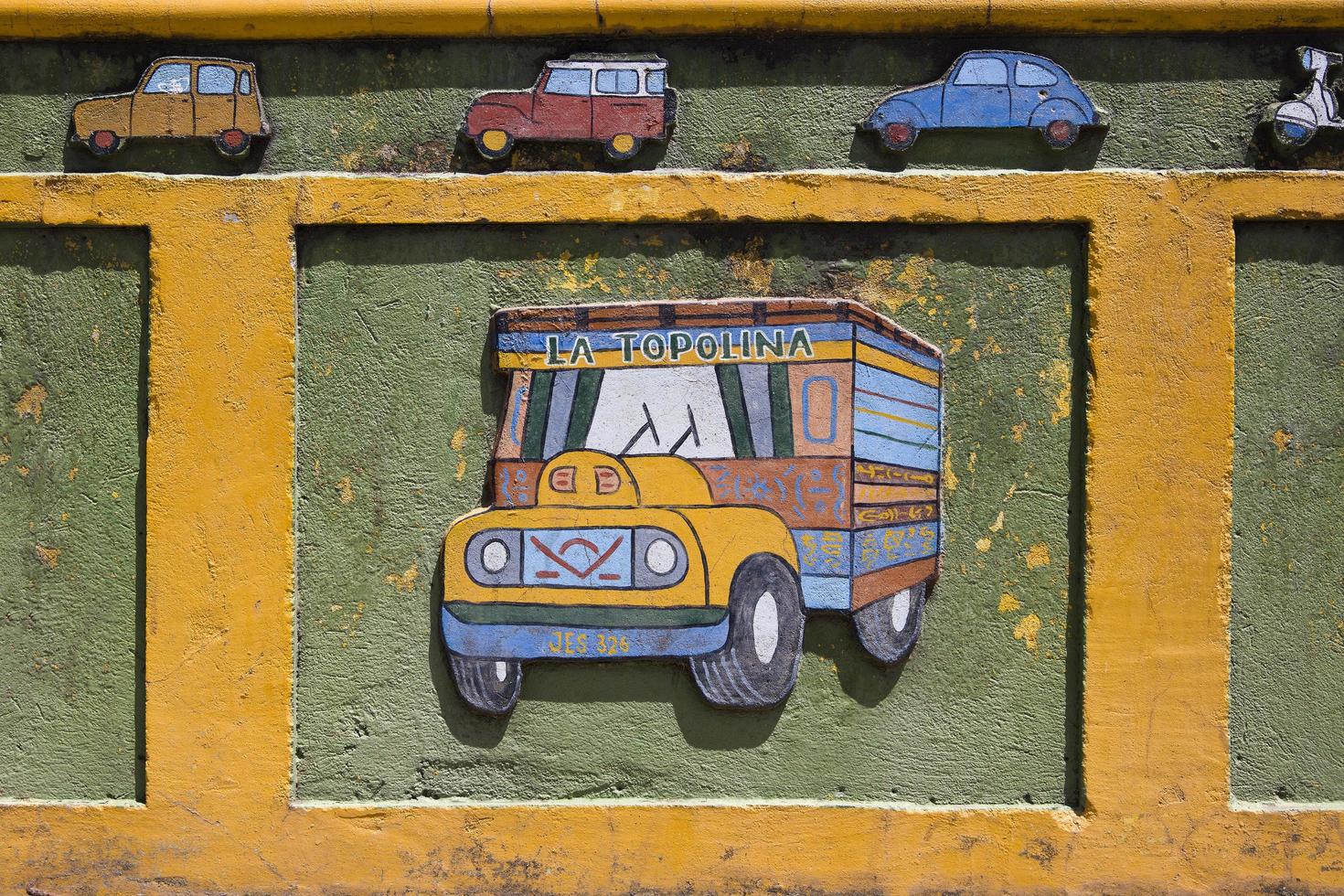 GUATAPE, COLOMBIA, SEPTEMBER 11, 2019 - Detail from colorful facade on the building in Guatape, Colombia. Each building in town Guatape has bright color tiles along the lower part of facade. photo