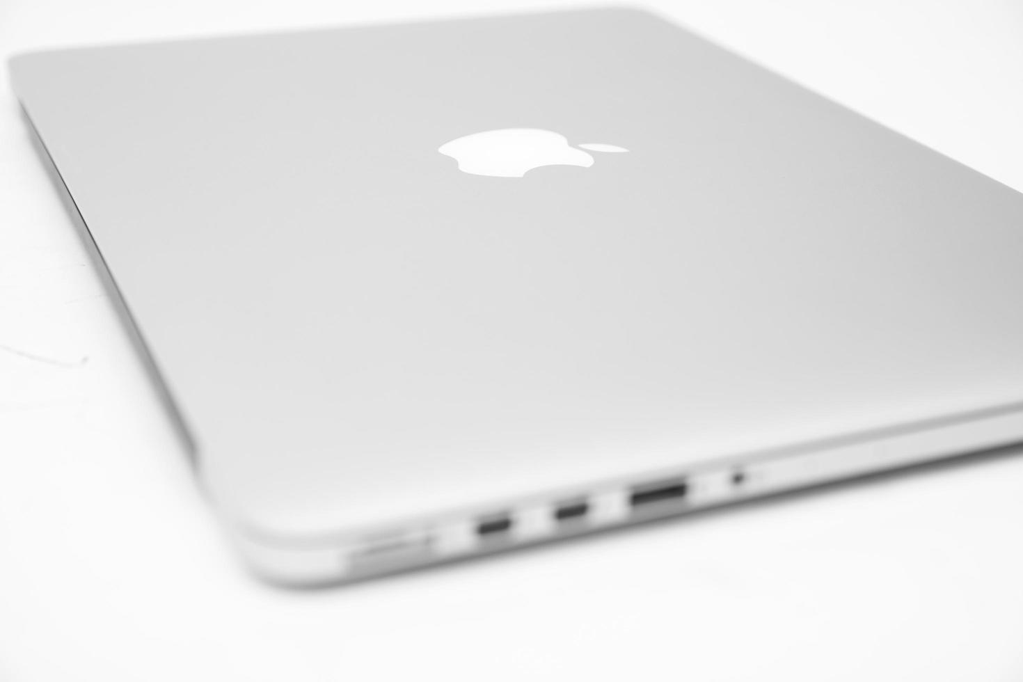 BELGRADE, SERBIA, MARCH 3, 2017 - MacBook computer isolated on white. The MacBook is a brand of notebook computers manufactured by Apple Inc. photo