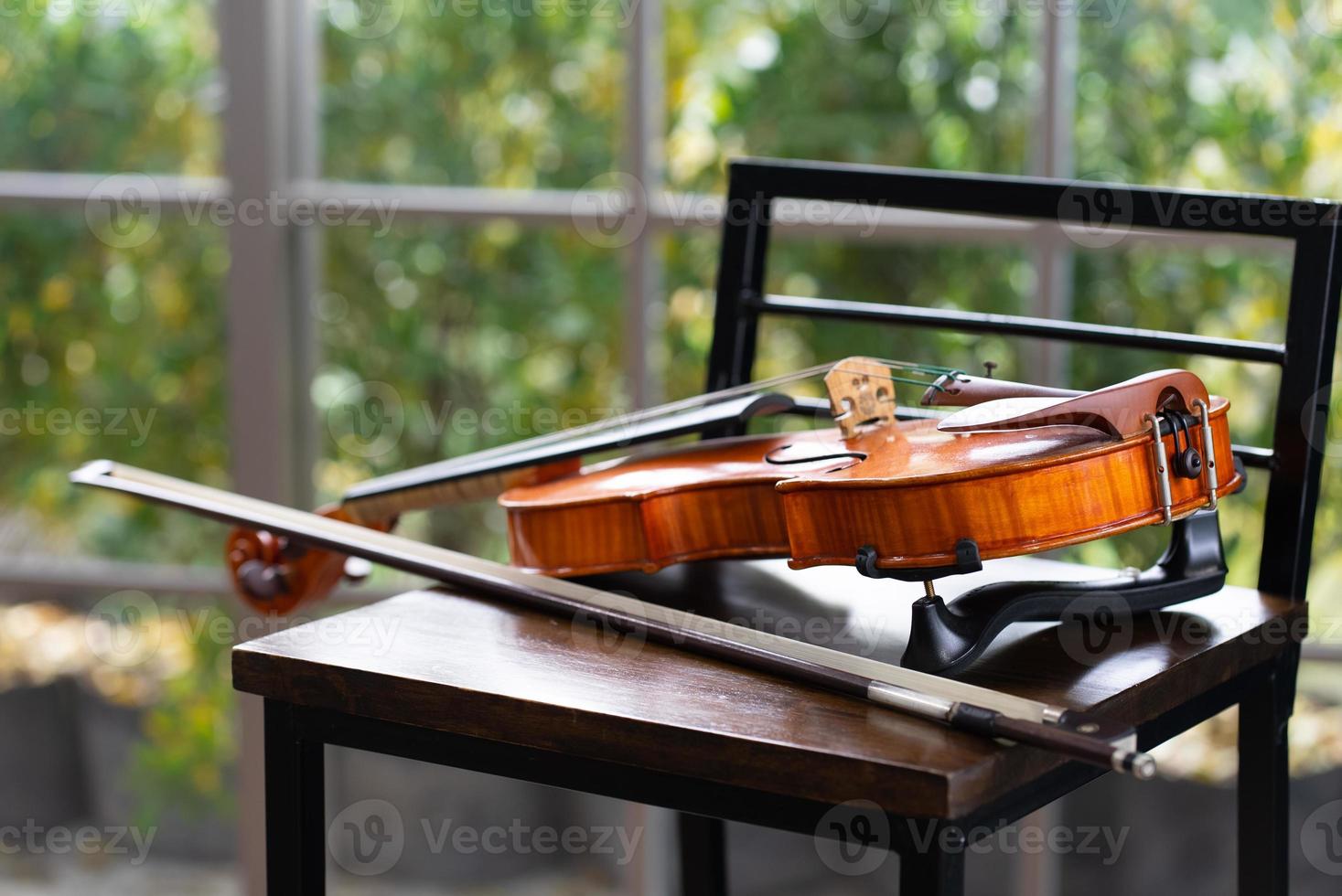 close up of violin on chair photo