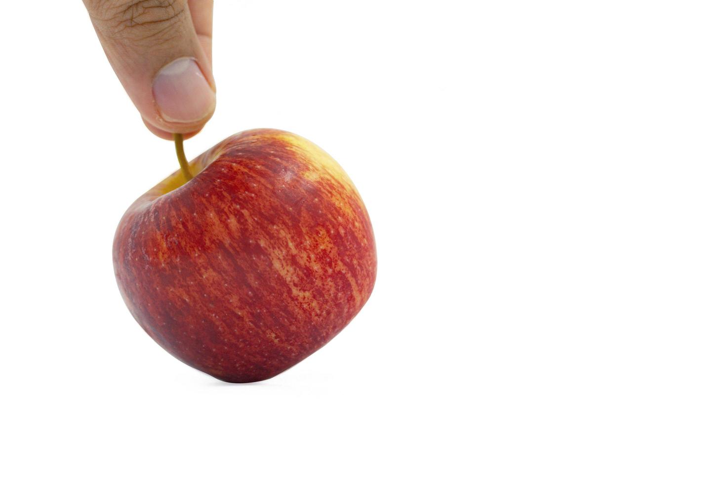 red apple in hand photo