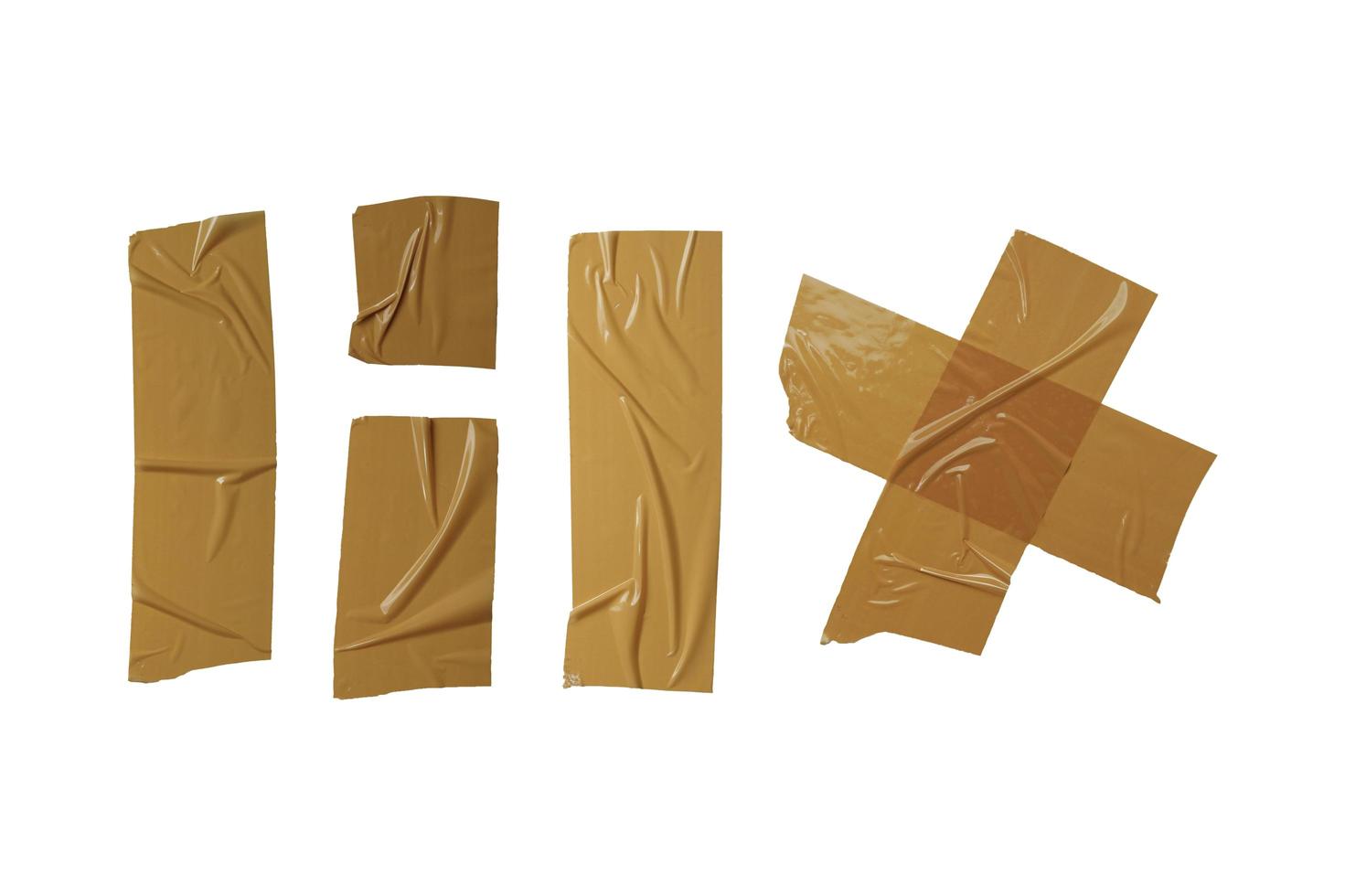 set of crumpled plastic tape collections in brown. adhesive sticky plaster pieces on white background. the variety of torn glued sticker tape for decorative elements. photo