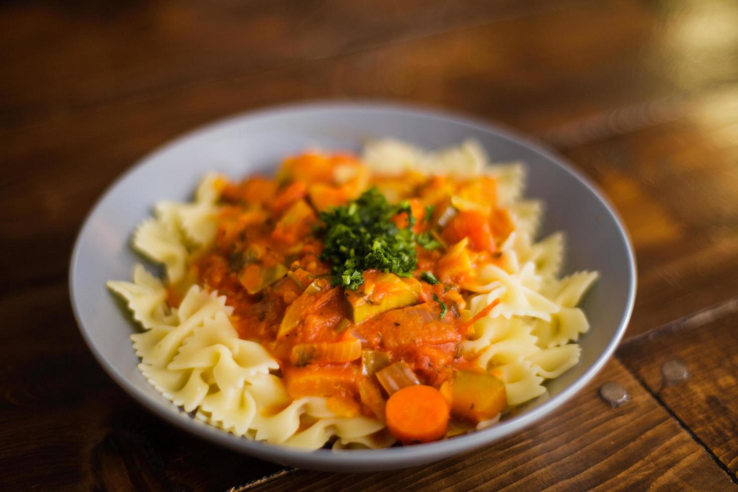 Home made plate of bow shaped pasta photo