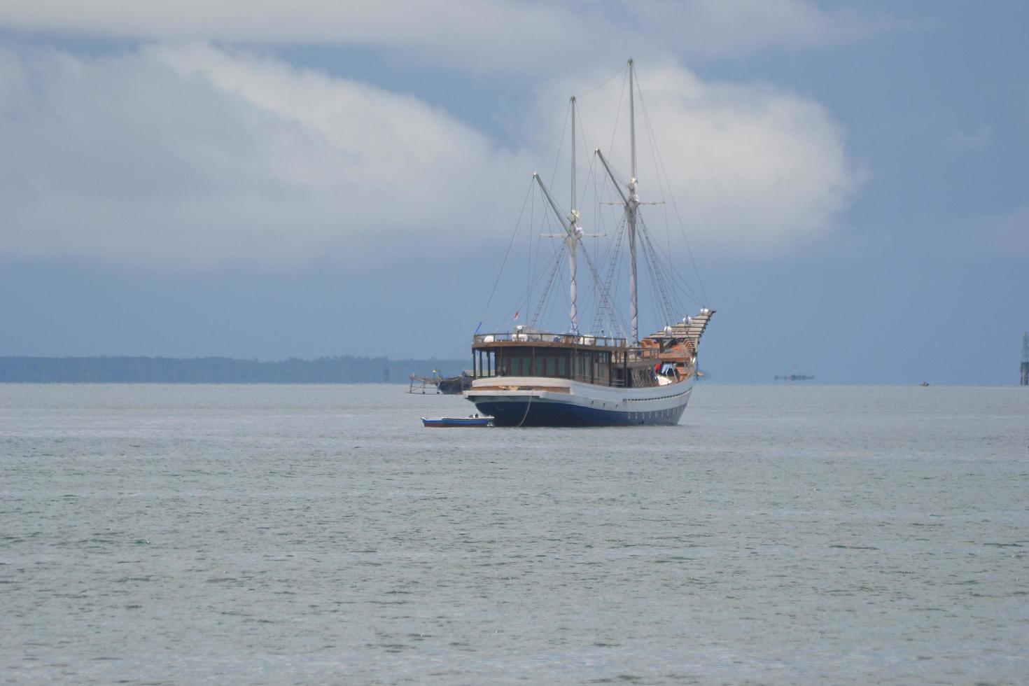 A cruiser ship mooring at the sea photo