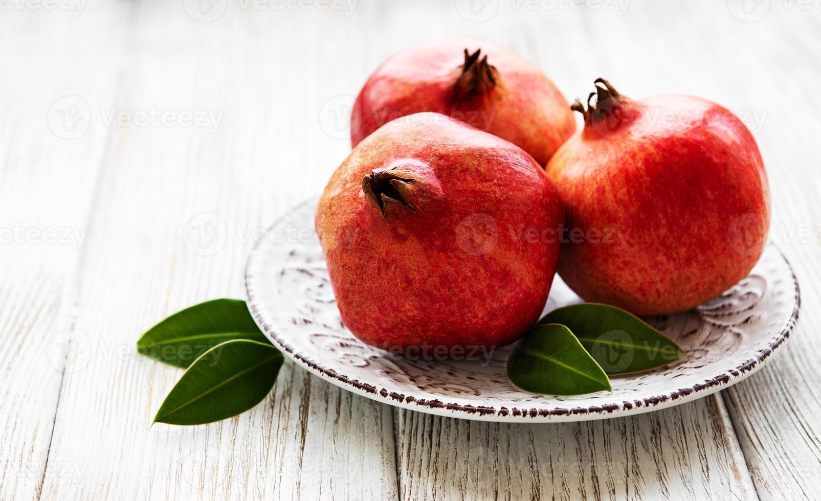 Juicy and ripe pomegranates photo