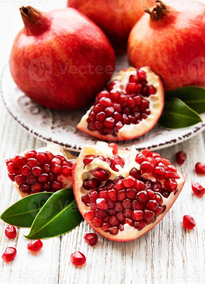 Juicy and ripe pomegranates photo