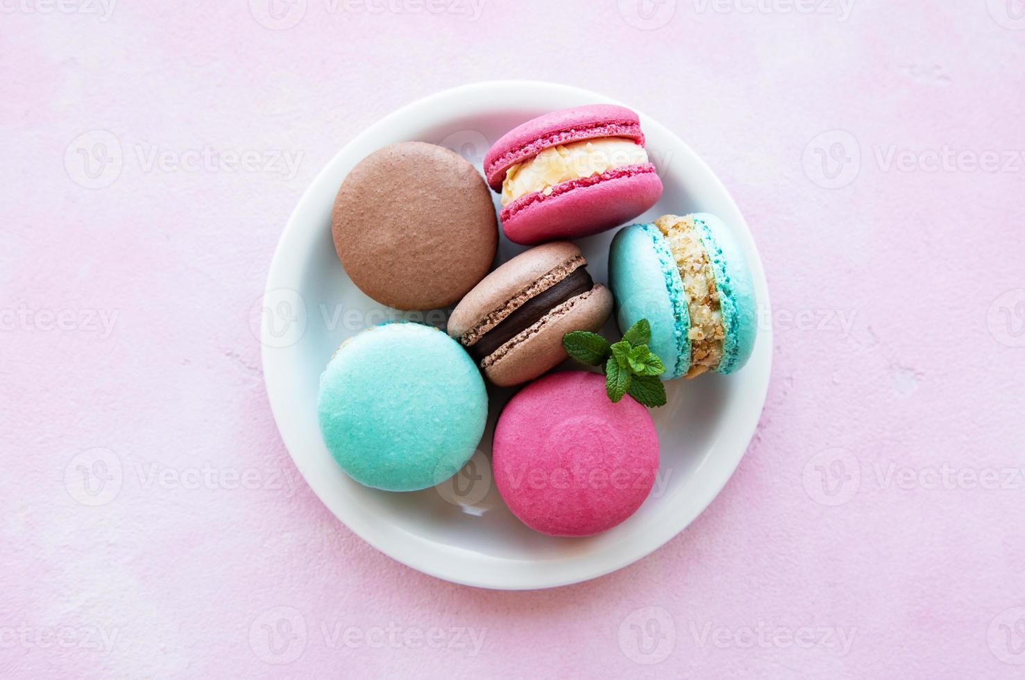 Colorful macaroons and mint photo