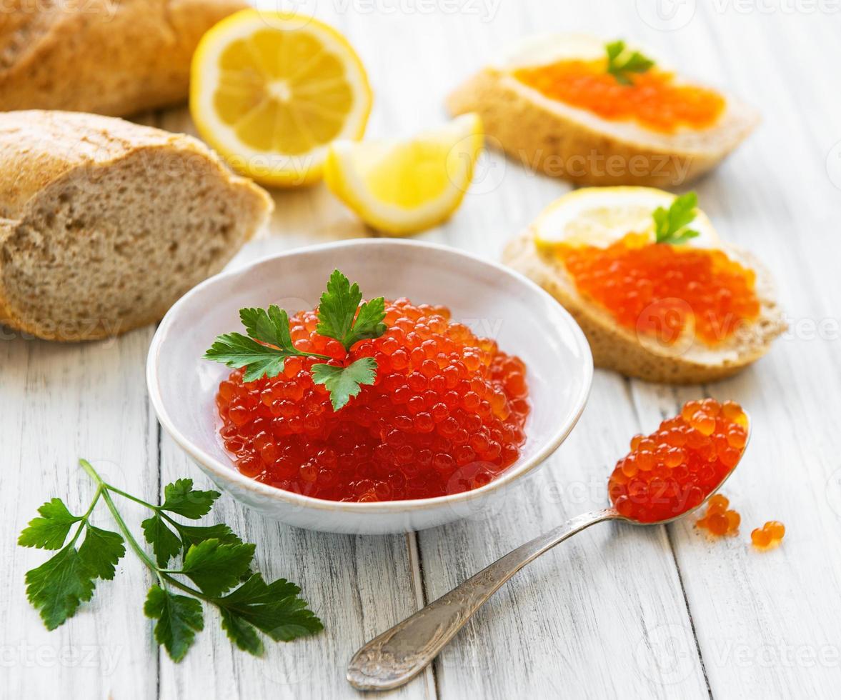 Red caviar in bowl photo