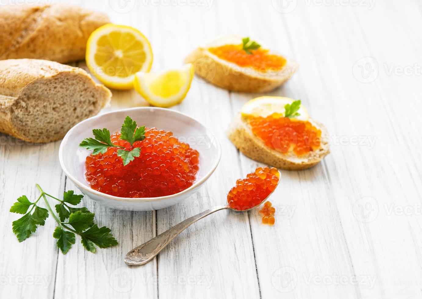 Red caviar in bowl photo