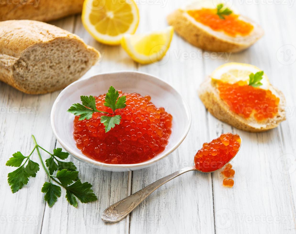 Red caviar in bowl photo