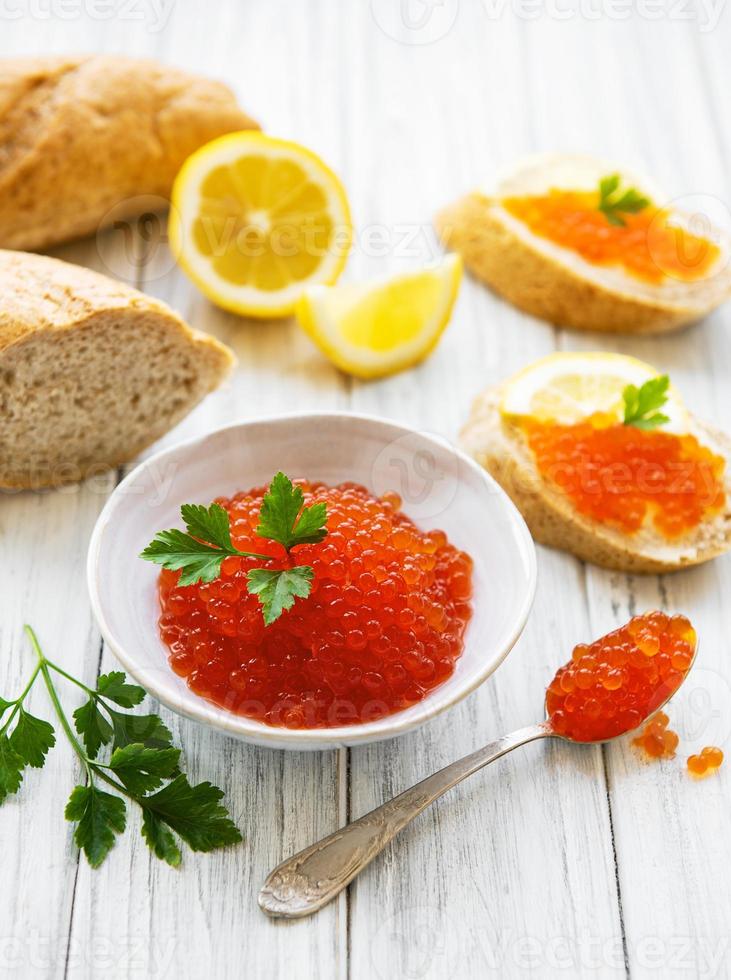 Red caviar in bowl photo