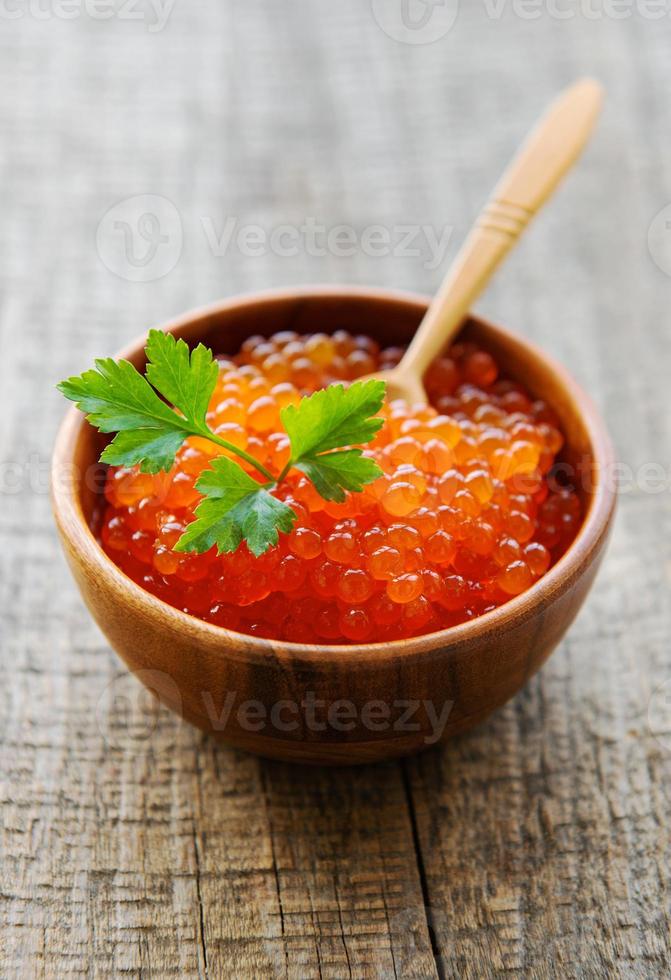 Red caviar in bowl photo