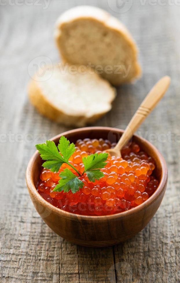 Red caviar in bowl photo