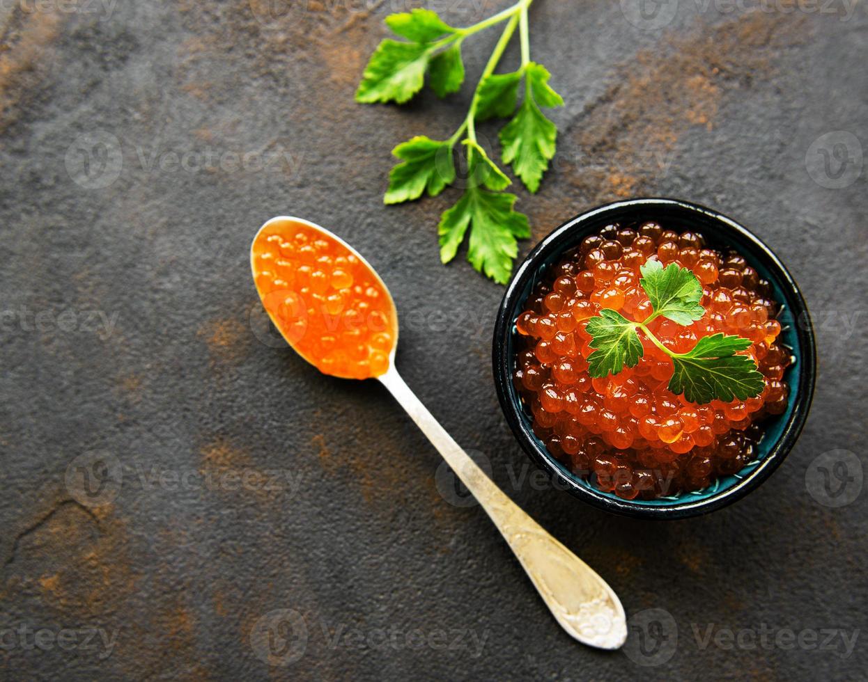 Red caviar in bowl photo