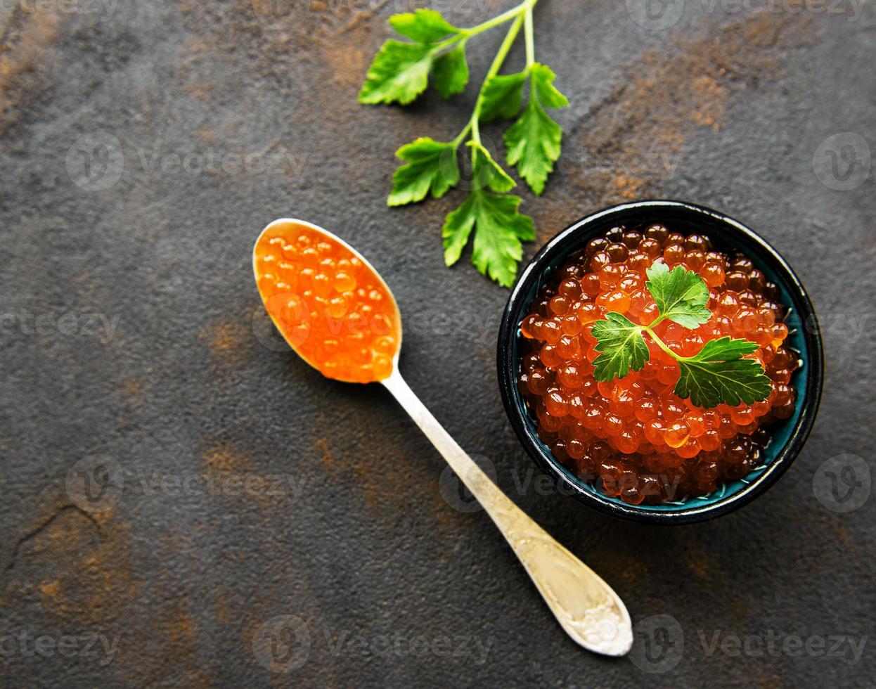 Red caviar in bowl photo