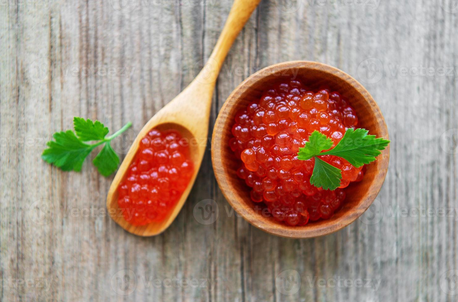 Red caviar in bowl photo