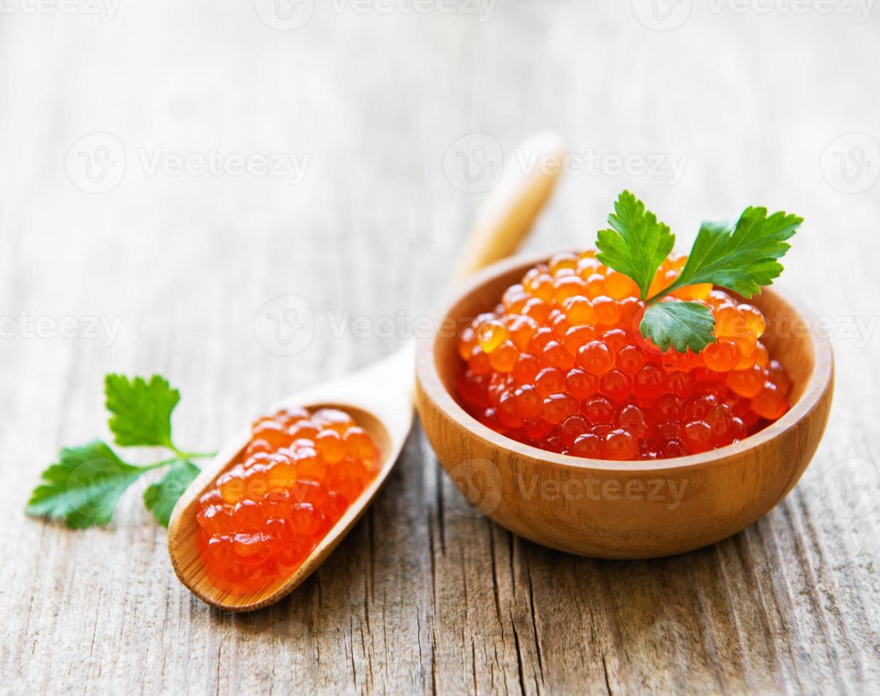 Red caviar in bowl photo