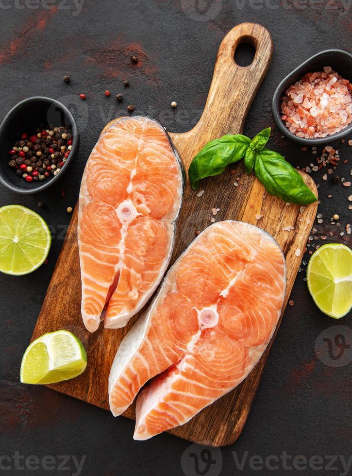 Raw salmon steaks photo