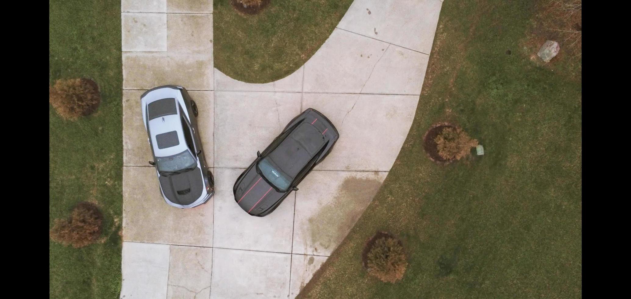 Two cars parked in private driveway photo