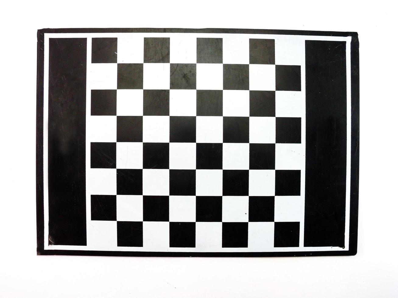 Chessboard black and white table on a white background. photo