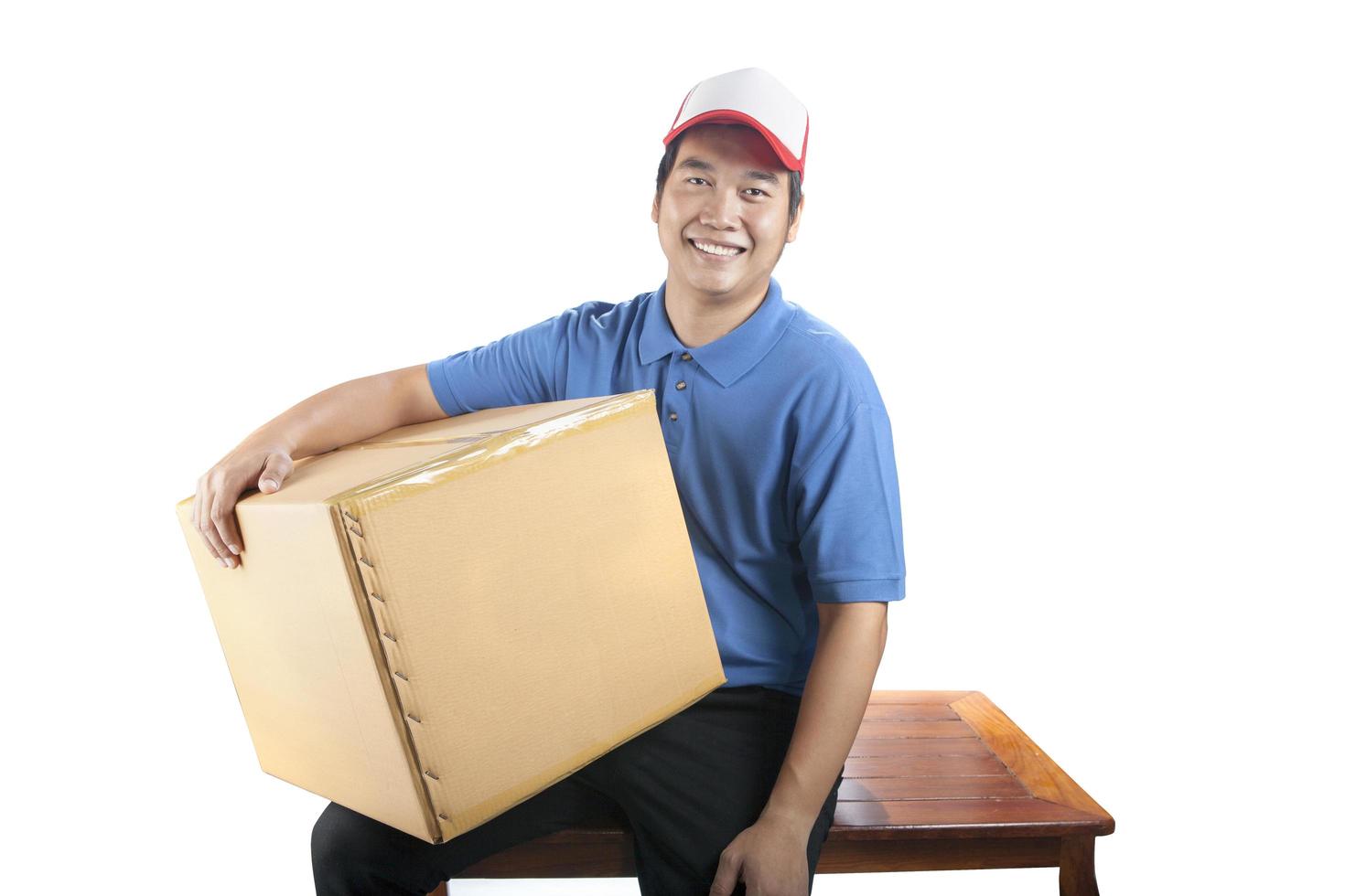 delivery man holding container box smiling face isolate white background photo