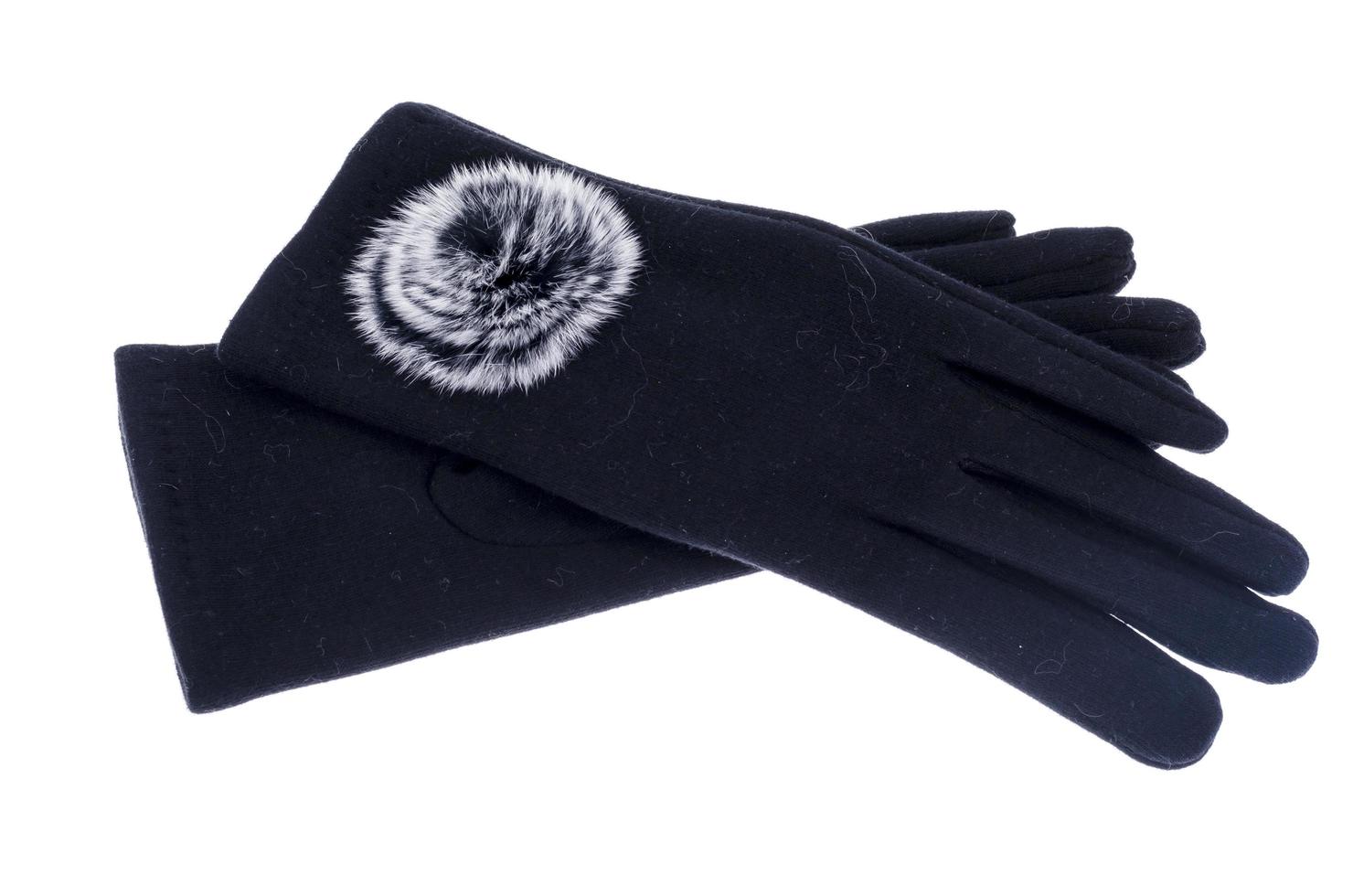 Textile women's black gloves with fur decoration. photo