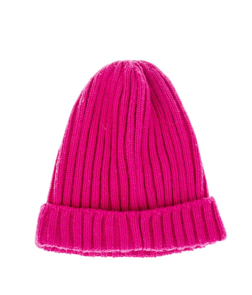 Knitted warm colored hat for winter, isolated on white background photo