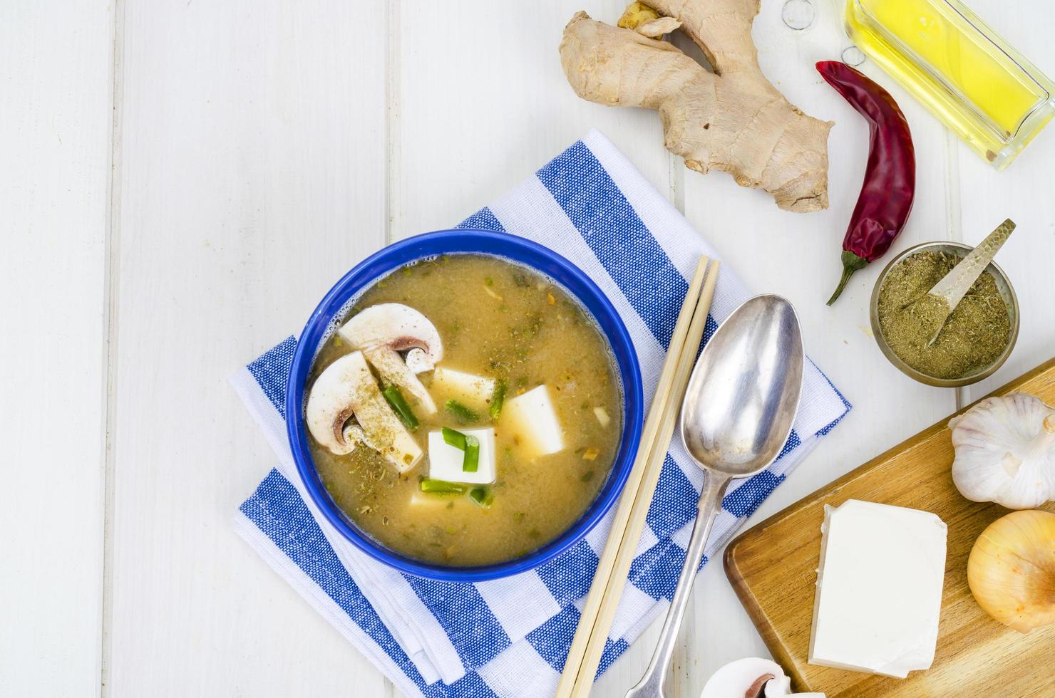 Vegetarian miso soup with tofu and mushrooms. photo