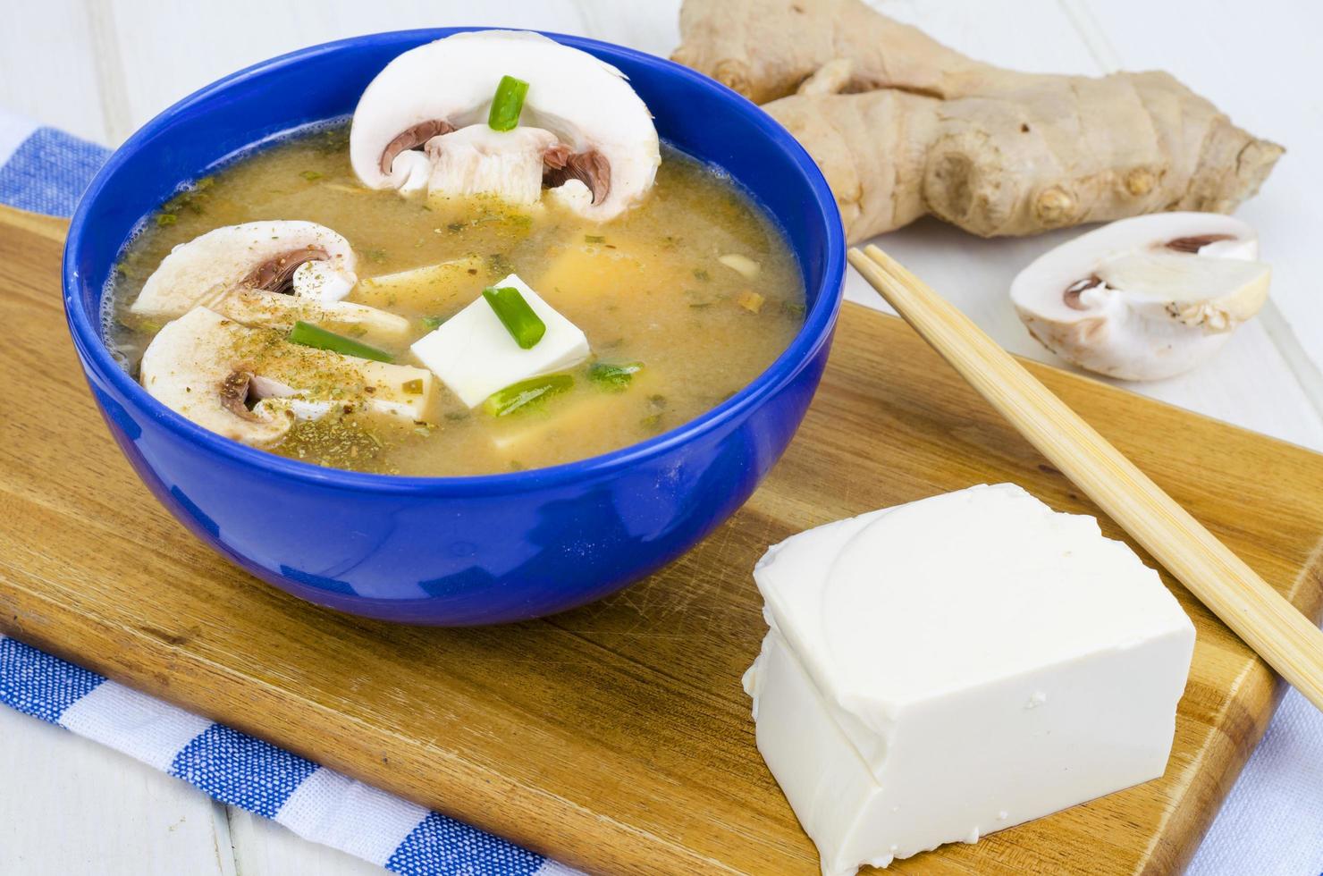 Vegetarian miso soup with tofu and mushrooms. photo