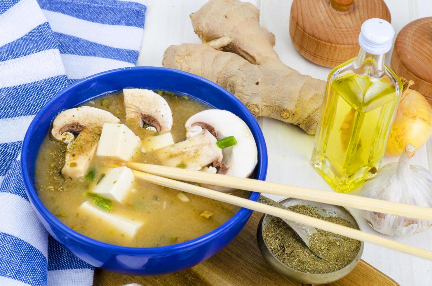 Vegetarian miso soup with tofu and mushrooms. photo