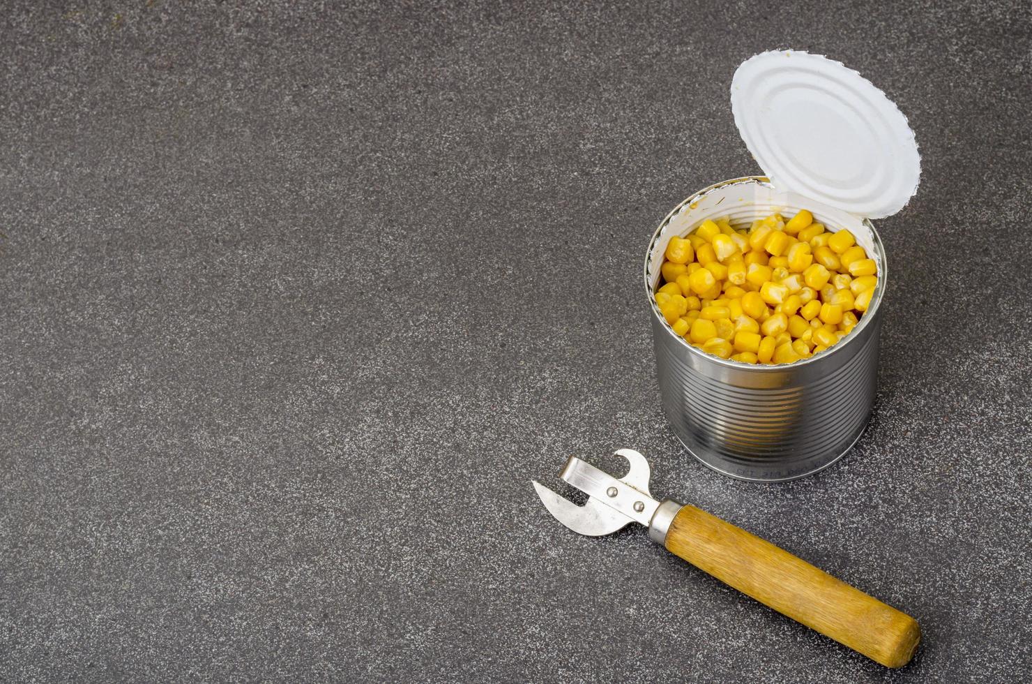 Canned ripe yellow sweet corn in jar. photo