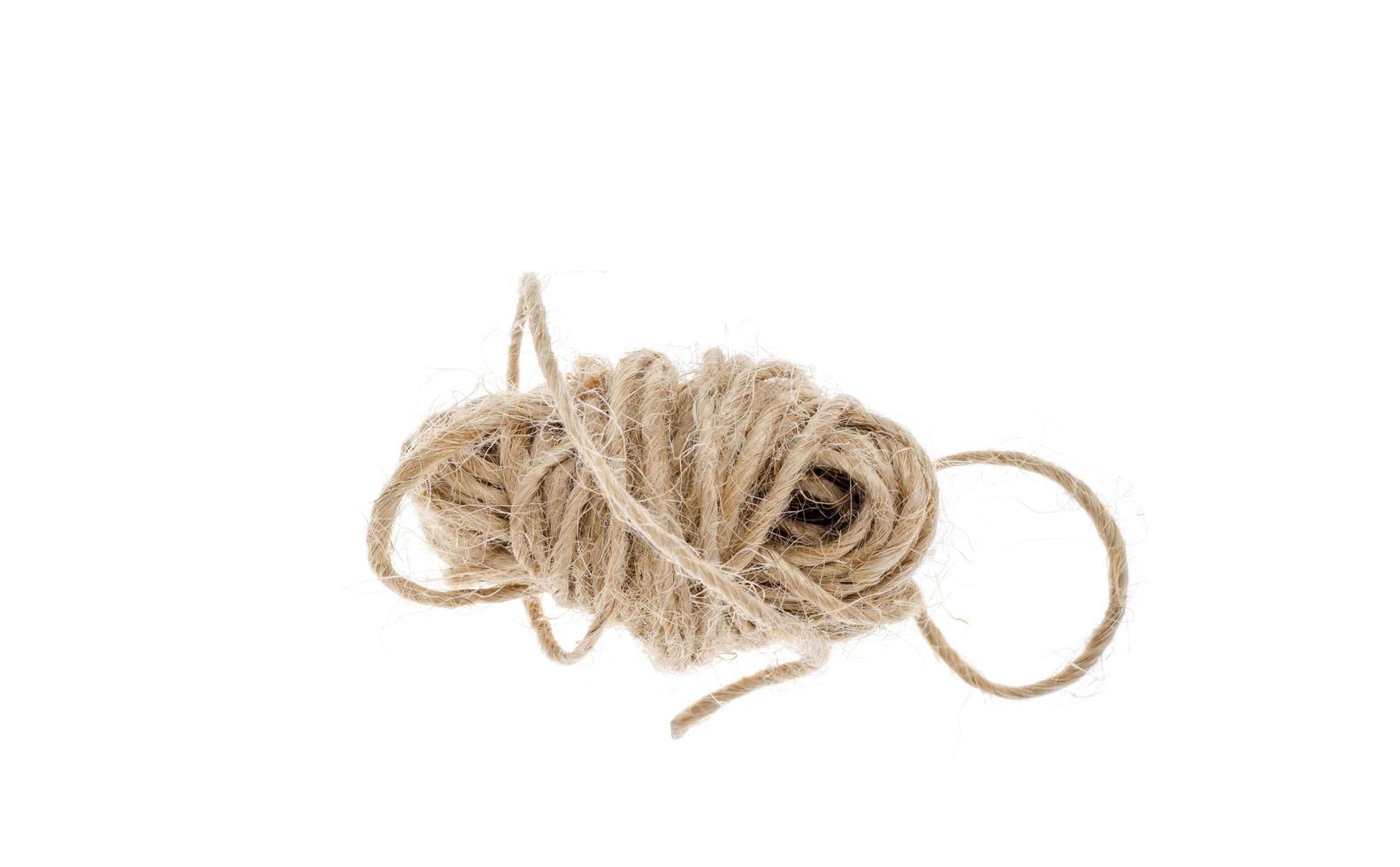 Small skein of rope isolated on white background photo
