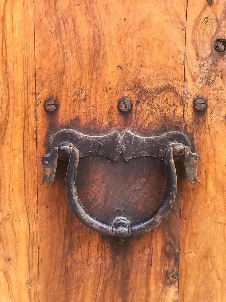 Antique vintage door with metal handle. photo. photo