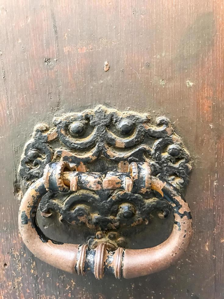 Antique vintage door with metal handle. photo