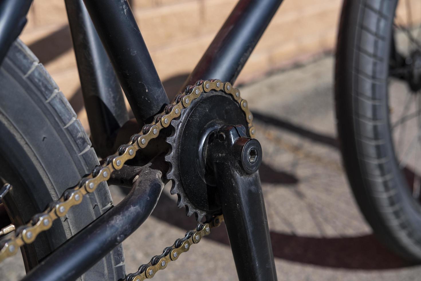 Black BMX bicycle outdoors photo