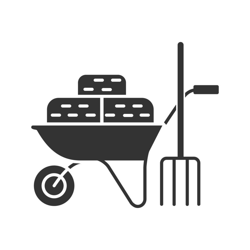 Wheelbarrow with bales of hay and pitchfork glyph icon. Agricultural work. Silhouette symbol. Negative space. Vector isolated illustration