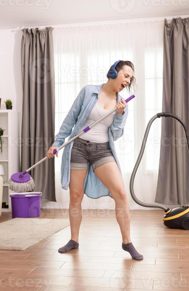 Woman with blue headphones photo